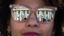 A pilgrim attends the canonization of St. John Henry Newman in Rome, Oct. 13, 2019. Mazur/cbcew.org.uk. / 