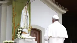 Pope Francis prays at the Sanctuary of Our Lady of Fatima in Portugal on May 12, 2017. Vatican Media. / 